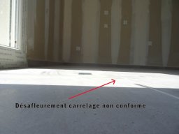 desafleurement de carrelage non conforme
